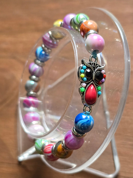 Kids beaded bracelet, multicoloured elastic bracelet with various colourful charms